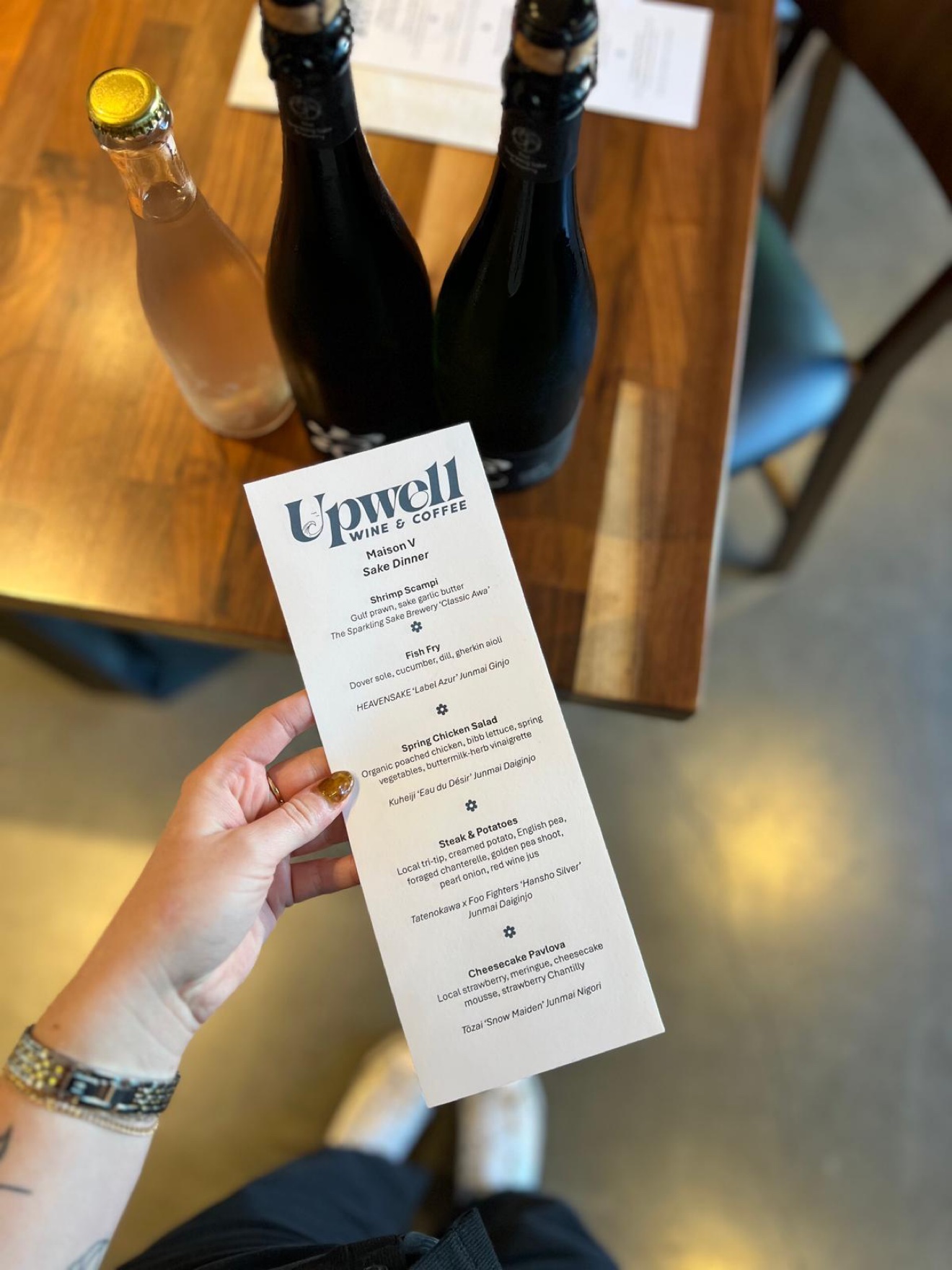 The printed menu for the Maison V Sake Dinner at Upwell Wine & Coffee, Seattle